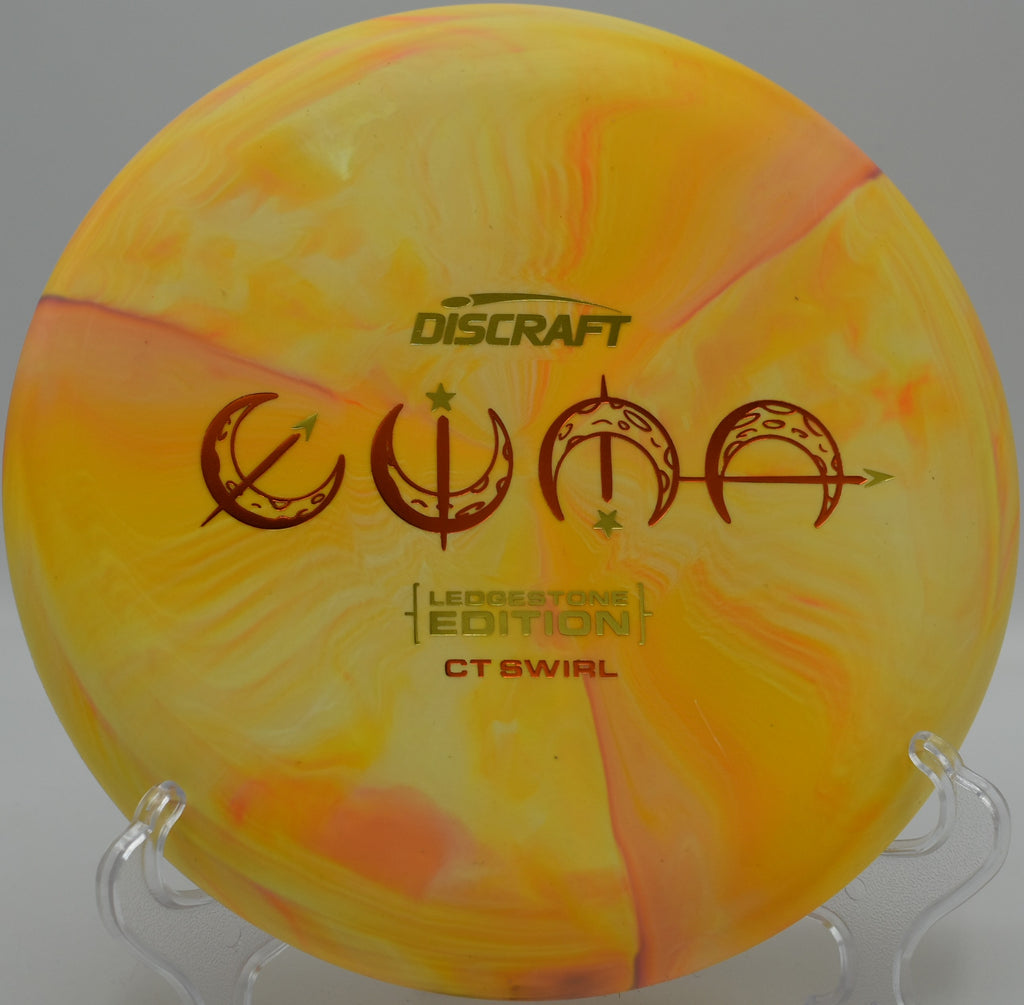 Discraft Luna CT Swirl edition floating over grass at Kensington Metropark in Milford, Michigan

