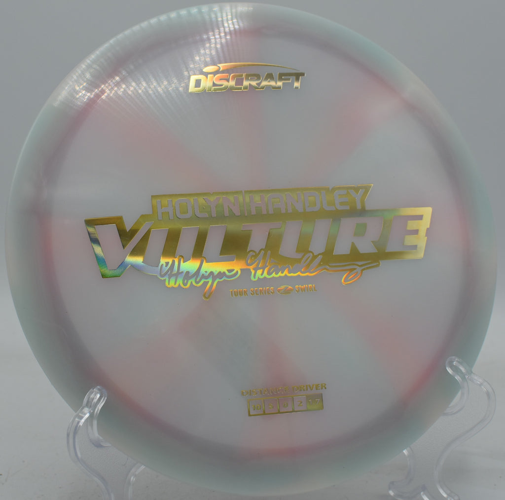 Discraft Vulture in Z Swirl plastic carving a technical forehand flex at Tyler State Park in Pennsylvania.

