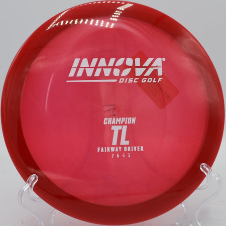 Innova Champion TL driver gliding through fairway gap on a clean release at Indian Camp Creek Disc Golf Course in Foristell, Missouri