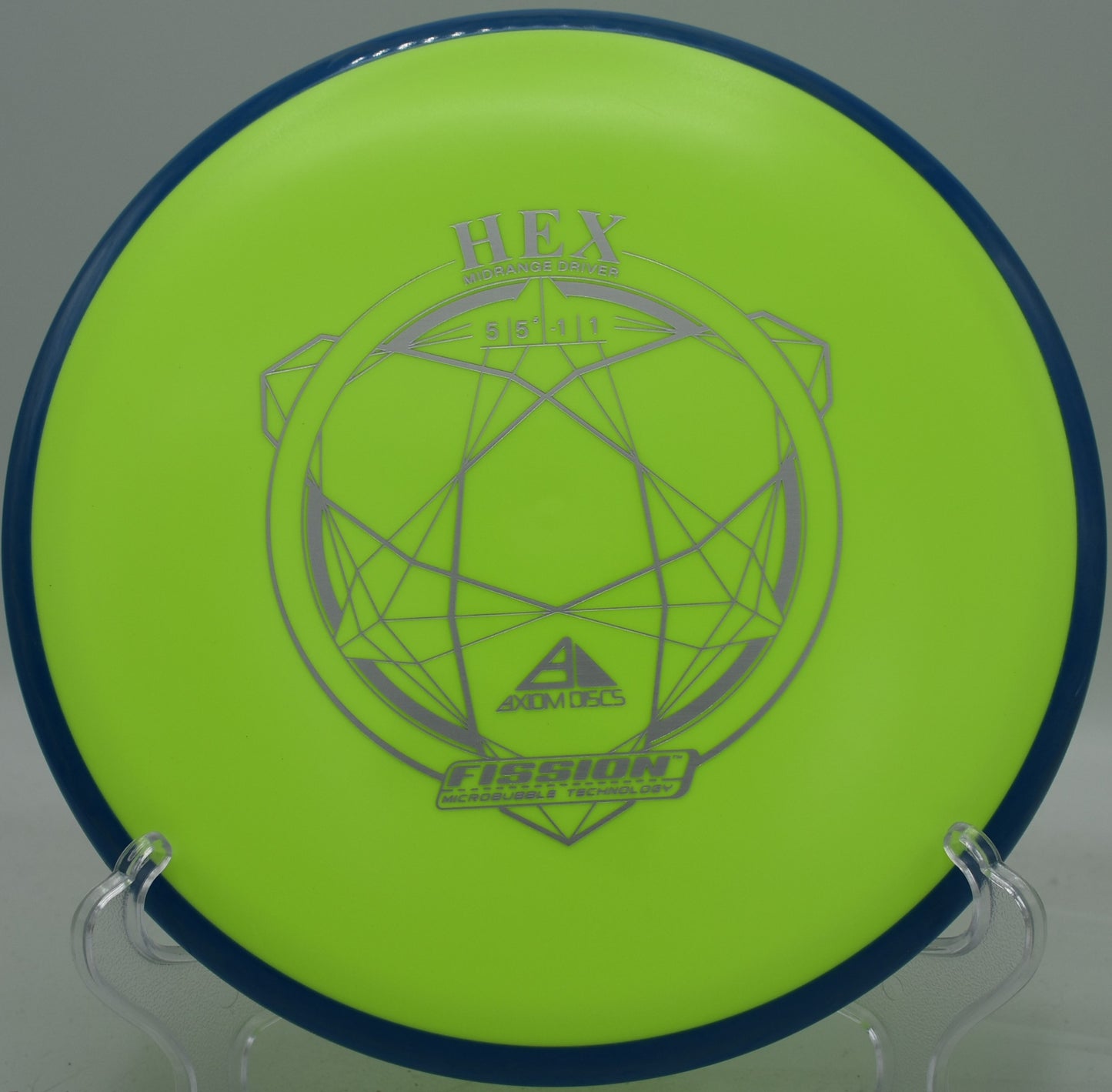 Disc golfer floating a turnover with Fission Hex at Base Camp DGC, UT

