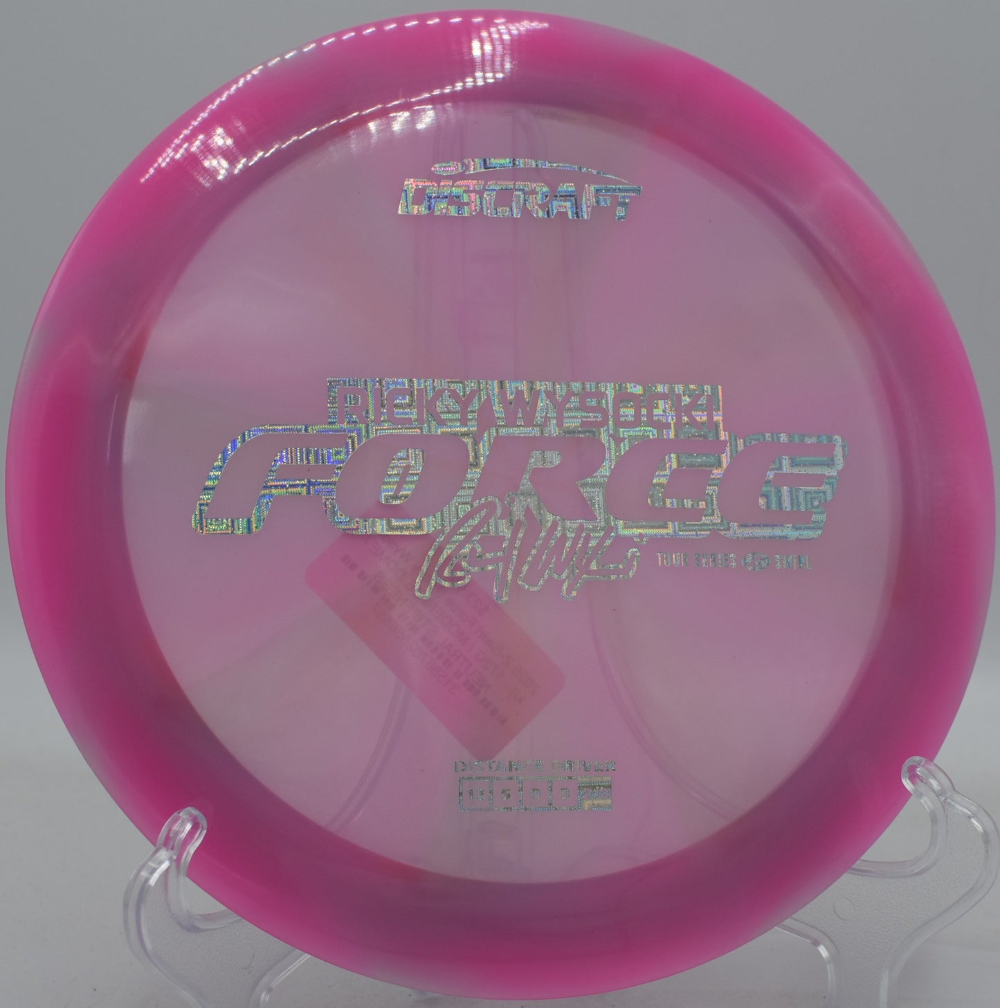 Discraft Force in Z Swirl plastic launched on a steep hyzer for max ground play at Brackett’s Bluff.

