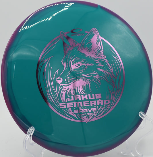 Latitude 64 Brave in Orbit plastic gliding past trees at Moraine State Park in Portersville, Pennsylvania.

