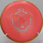 Disc golfer shaping a gentle S-curve with Fission Hex at Lake Marshall, VA

