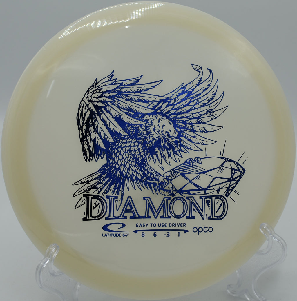 A vibrant Opto Diamond disc resting on the tee pad at Tyler State Park Disc Golf Course, Newtown, Pennsylvania.