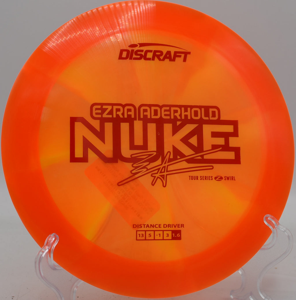 Z Swirl Nuke blasting off the tee with maximum glide, fading late at the edge of Circle 1 at Northwood Black.


