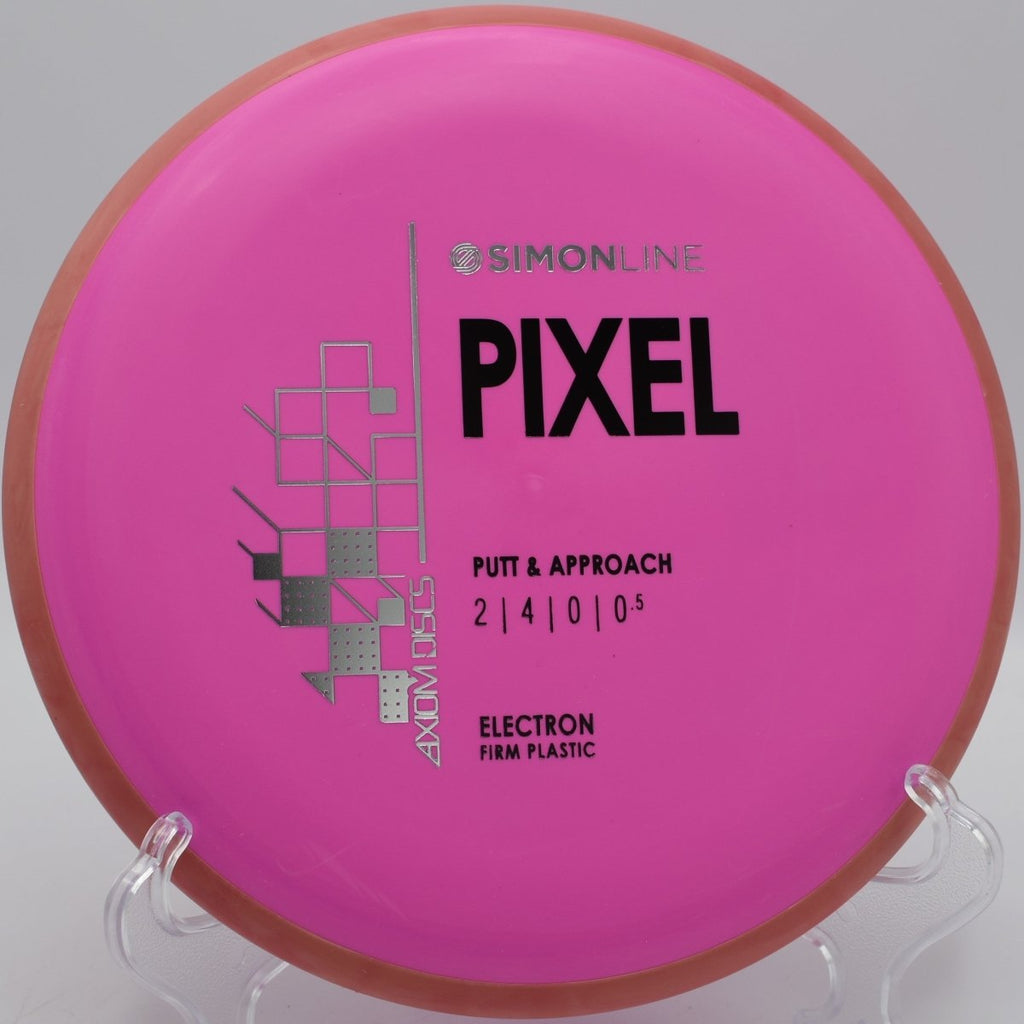 MVP Electron Firm Pixel putter parked under basket chains after a clean upshot at North Glen Disc Golf Course in Glen Burnie, Maryland