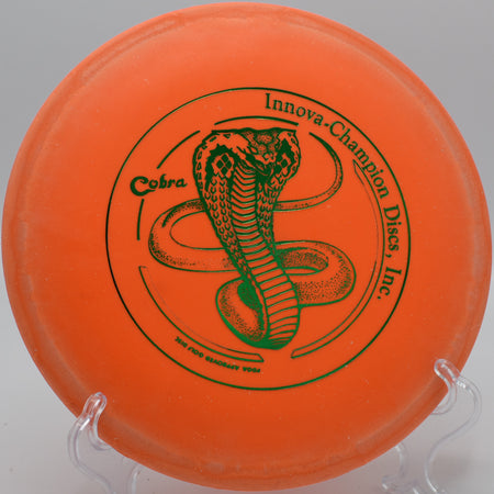 DX Cobra flying effortlessly through a wooded tunnel on Hole 5 at Panther Creek Disc Golf Course, Springfield, Illinois.