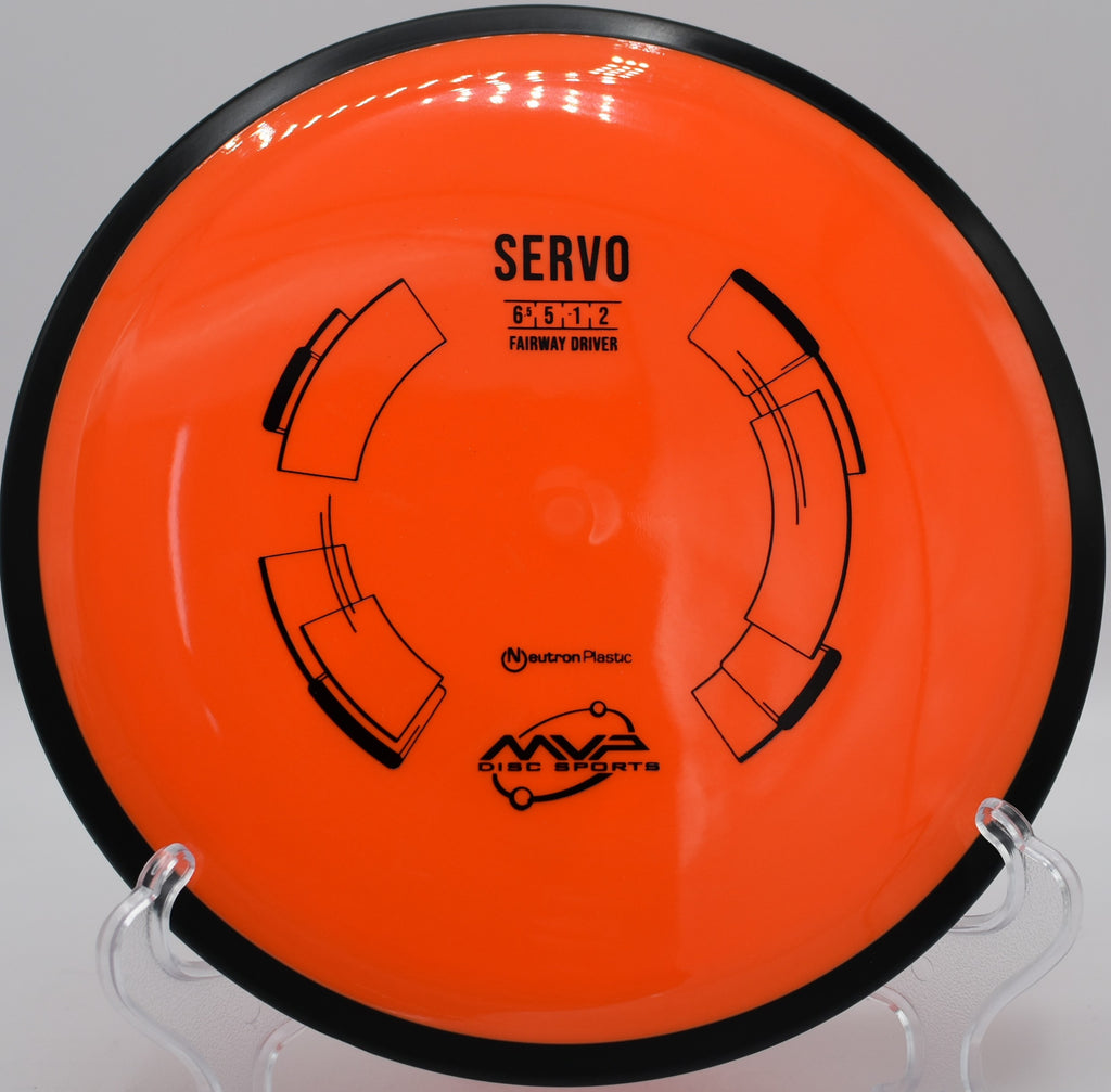 MVP Neutron Servo spinning through an uphill tunnel shot at Sabattus Disc Golf Course in Sabattus, Maine, with reliable hand feel.

