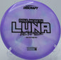 Z Swirl Luna released from a hillside stance, fading gently toward a sloped basket at Blue Ribbon Pines in Minnesota.

