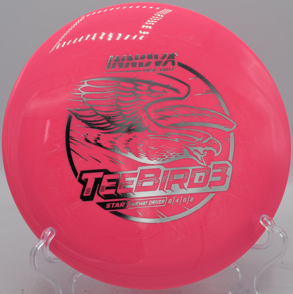 Star TeeBird3 gliding down a downhill fairway on a touch hyzer at Blue Ribbon Pines in Minnesota.

