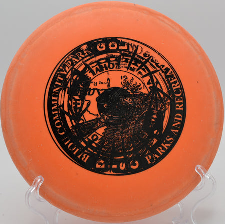 Innova DX Cobra flipping up to flat and gliding long on Hole 3 at Water Works Park Disc Golf Course, Kansas City, Missouri.