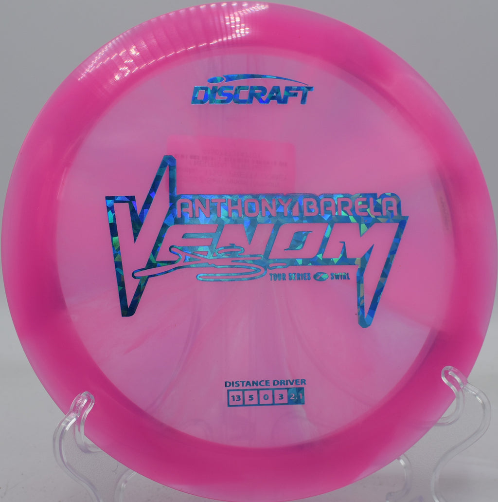 Big hyzer shot with the Z Swirl Venom crashing into a sloped green at DeLaveaga Disc Golf Course.

