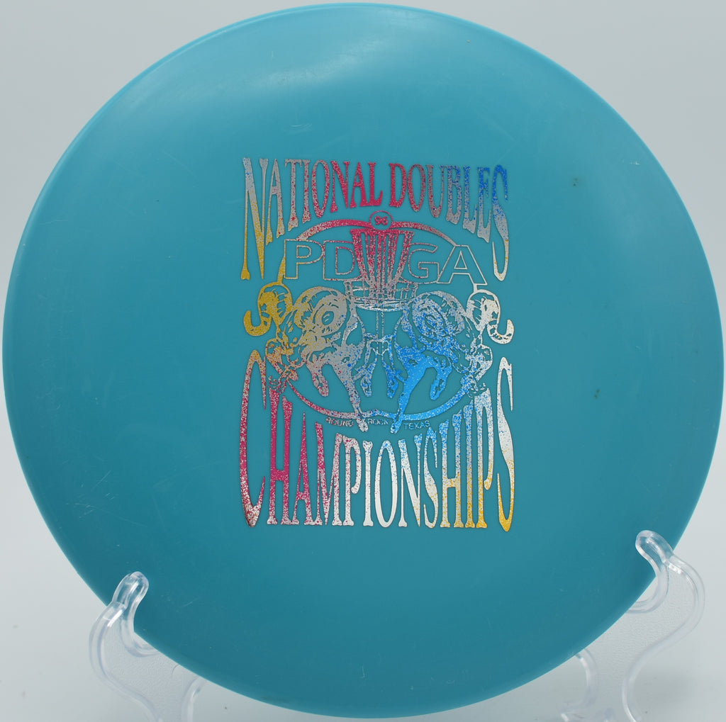 Innova DX Cobra settling softly near the basket on Hole 4 at Cedar Hill Disc Golf Course, Nashville, Tennessee.