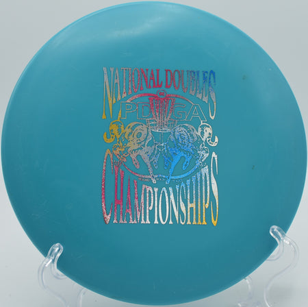 Innova DX Cobra settling softly near the basket on Hole 4 at Cedar Hill Disc Golf Course, Nashville, Tennessee.