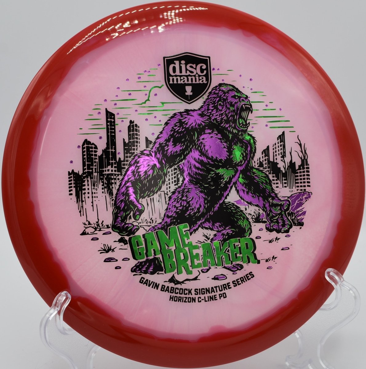 Horizon C-Line PD disc golf control driver gliding through a wooded gap at Water Works Park Disc Golf Course, Kansas City, Missouri