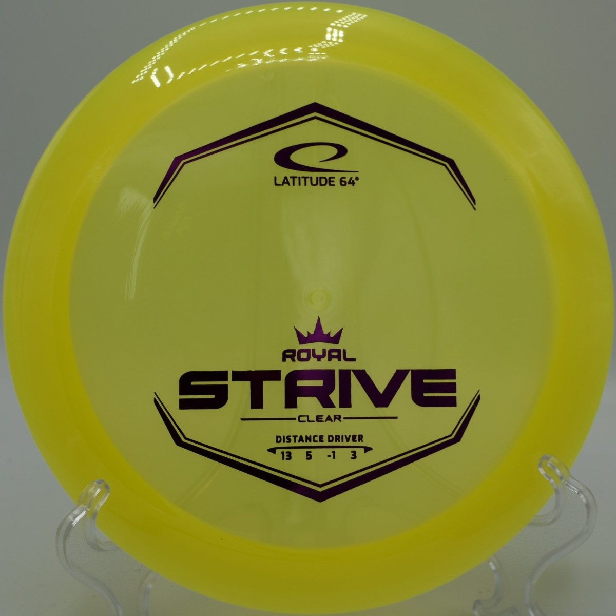 Clear Strive disc golf distance driver carving a long flex line at Rolling Pines Disc Golf Course, Wilkesboro, North Carolina