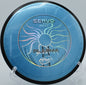 MVP Plasma Servo thrown on a flat line at Flip City Disc Golf Park in Shelby, Michigan, with reliable glide and manageable fade.

