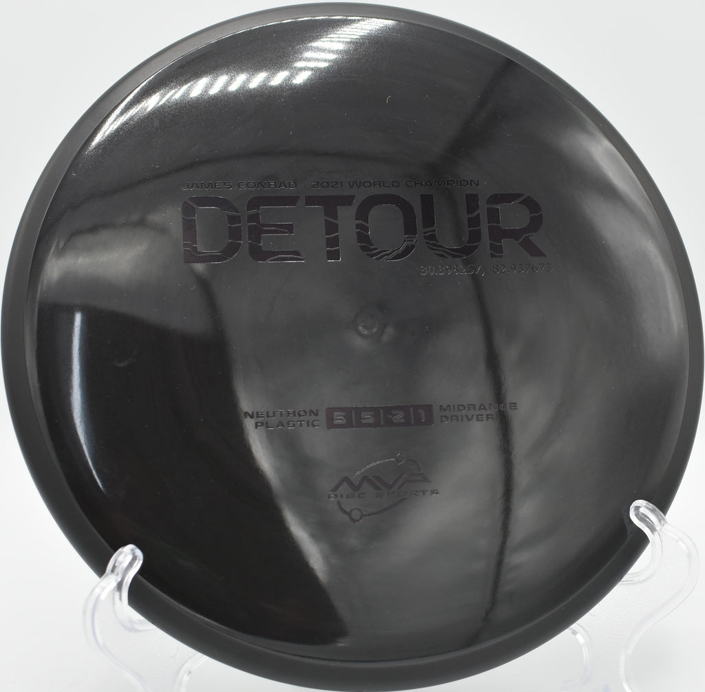 Neutron Detour midrange flying a gentle turnover at Maple Hill Disc Golf Course in Leicester, Massachusetts, ideal for touch shots and shaping soft lines.

