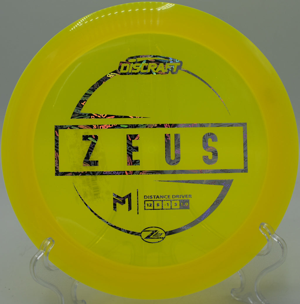 "Z Lite Zeus – Paul McBeth signature driver ideal for long turnover lines at North Cove Disc Golf Course in North Carolina."


