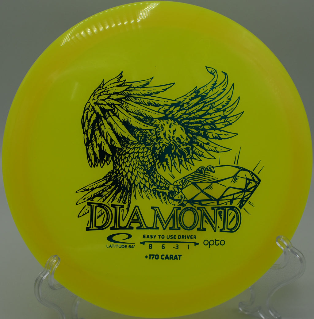 Bright Opto Diamond disc resting on a forest trail at Milo McIver Disc Golf Course, Estacada, Oregon.