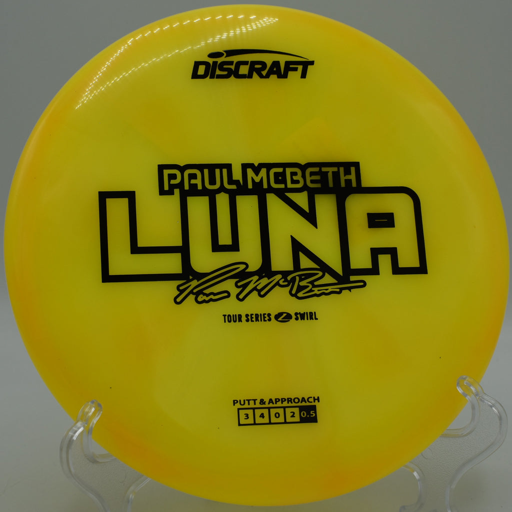 Luna flashing past the cage and catching chains from behind for a reverse dunk.

