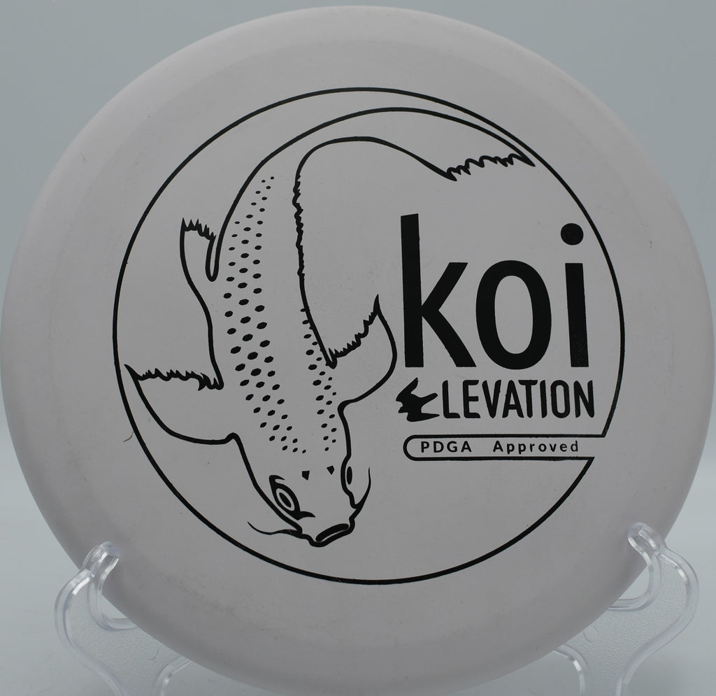 ecoFIRM Koi flying soft and floaty toward the basket at Maple Hill Disc Golf Course in Leicester, Massachusetts

