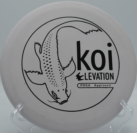 ecoFIRM Koi flying soft and floaty toward the basket at Maple Hill Disc Golf Course in Leicester, Massachusetts

