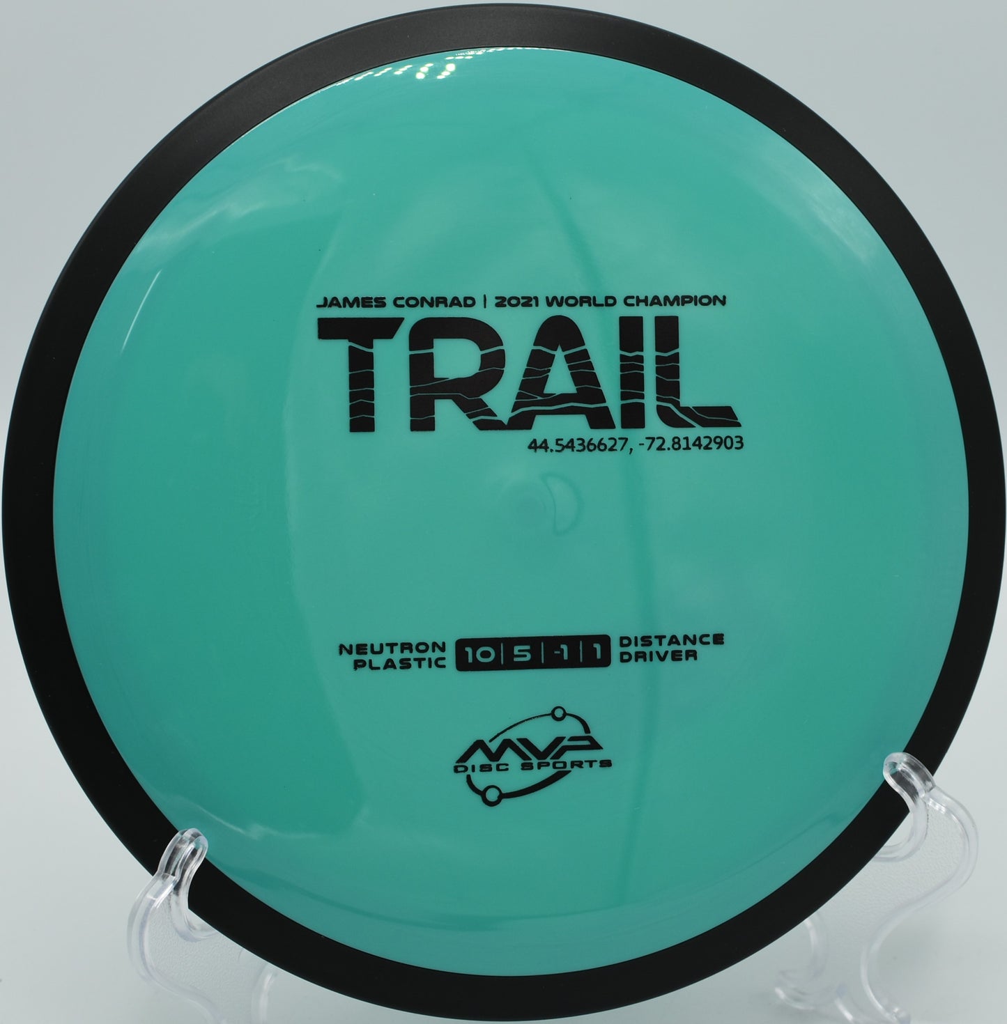 Neutron Trail disc achieving max glide at Tall Pines Disc Golf Course, Friendswood, Texas.