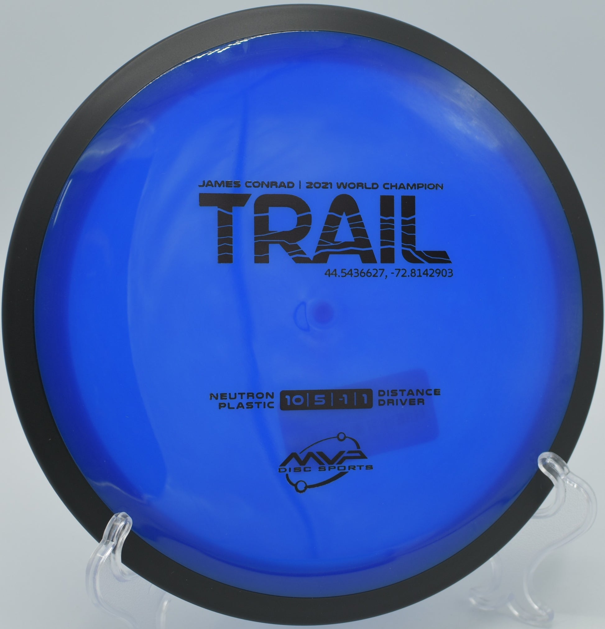 MVP Neutron Trail flying through wooded terrain at Cedar Hill Disc Golf Course, Nashville, Tennessee.