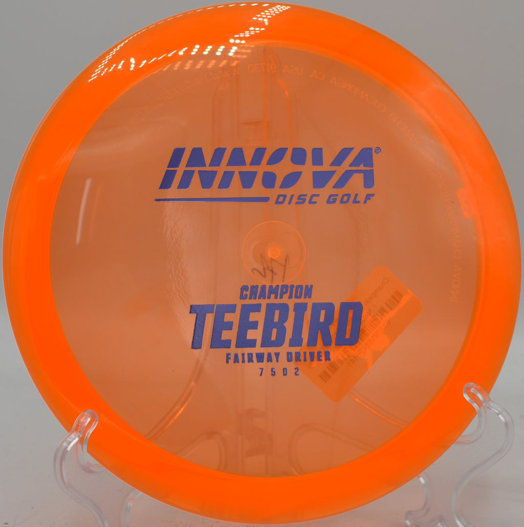 Champion TeeBird mid-flight during a headwind shot at Walnut Ridge DGC in Johnston, Iowa

