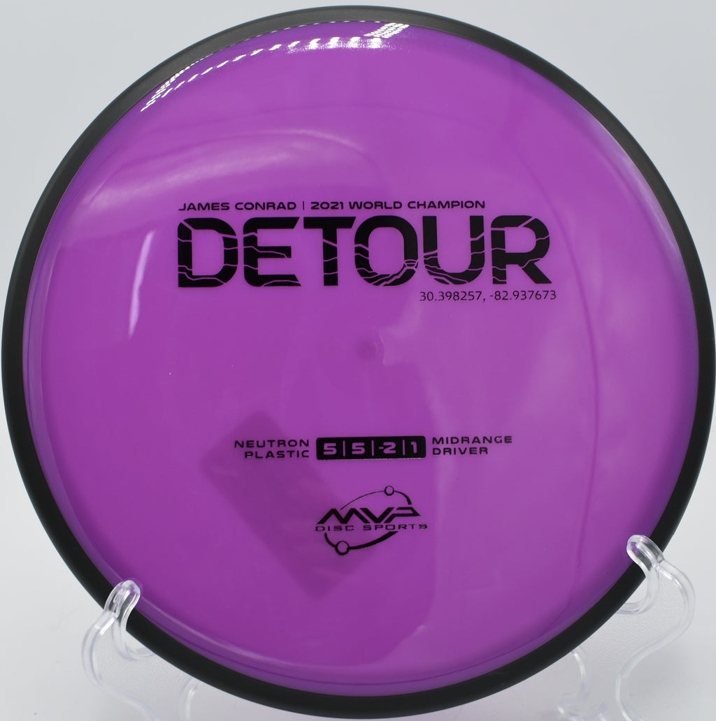 Neutron Detour hyzer flips through the trees at Harmon Hills Disc Golf Course in Fall Branch, Tennessee.

