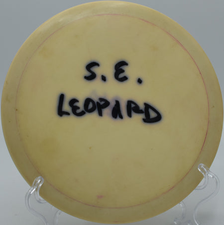 Special Edition Leopard flipping up to flat on Hole 5 at Trophy Club Disc Golf Course, Trophy Club, Texas.