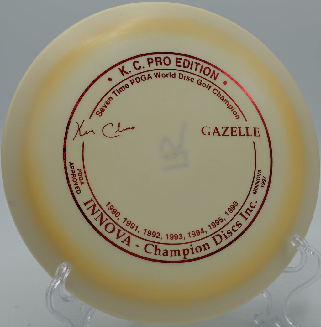 KC Pro Gazelle fading gently toward the basket on Hole 9 at BlueGill Disc Golf Course, Wayland, Michigan.