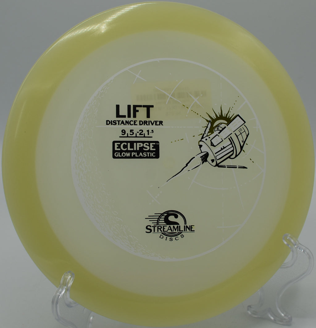 Eclipse Lift glowing in the dark on a long drive at Pine Valley Ranch Disc Golf Course in Pine, Colorado.