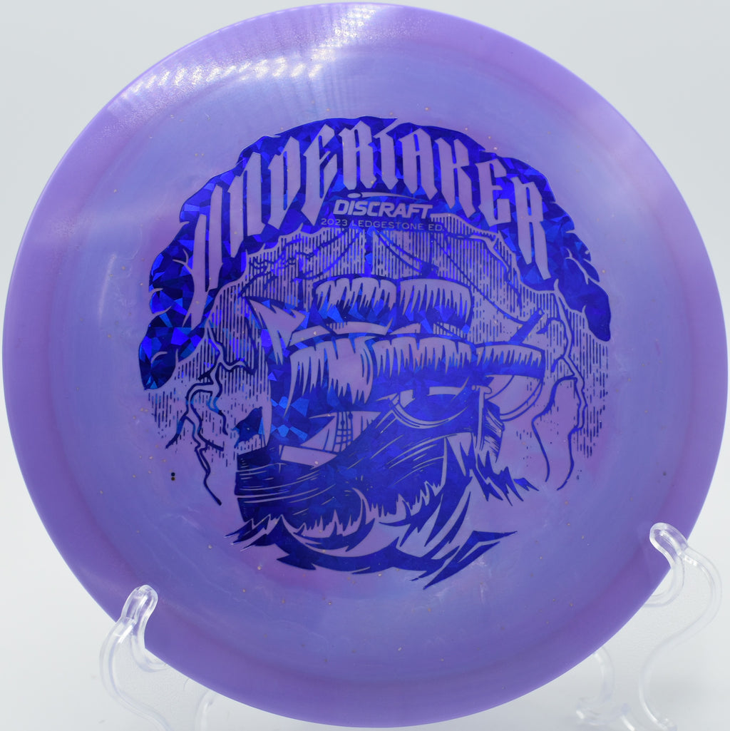ESP Glo Sparkle Undertaker threading a wooded gap with precision on Hole 14 at Panther Creek Disc Golf Course, Springfield, Illinois.