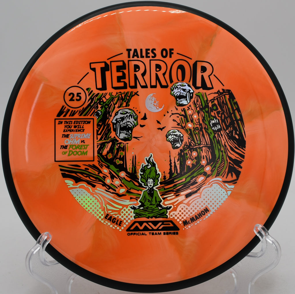 Disc golfer putting with an MVP Ohm at Blue Ribbon Pines in East Bethel, Minnesota