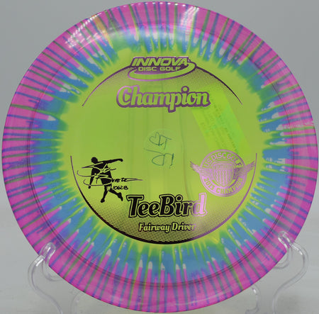 Champion TeeBird mid-flight during a controlled fairway drive at Tom Brown Park in Tallahassee, Florida

