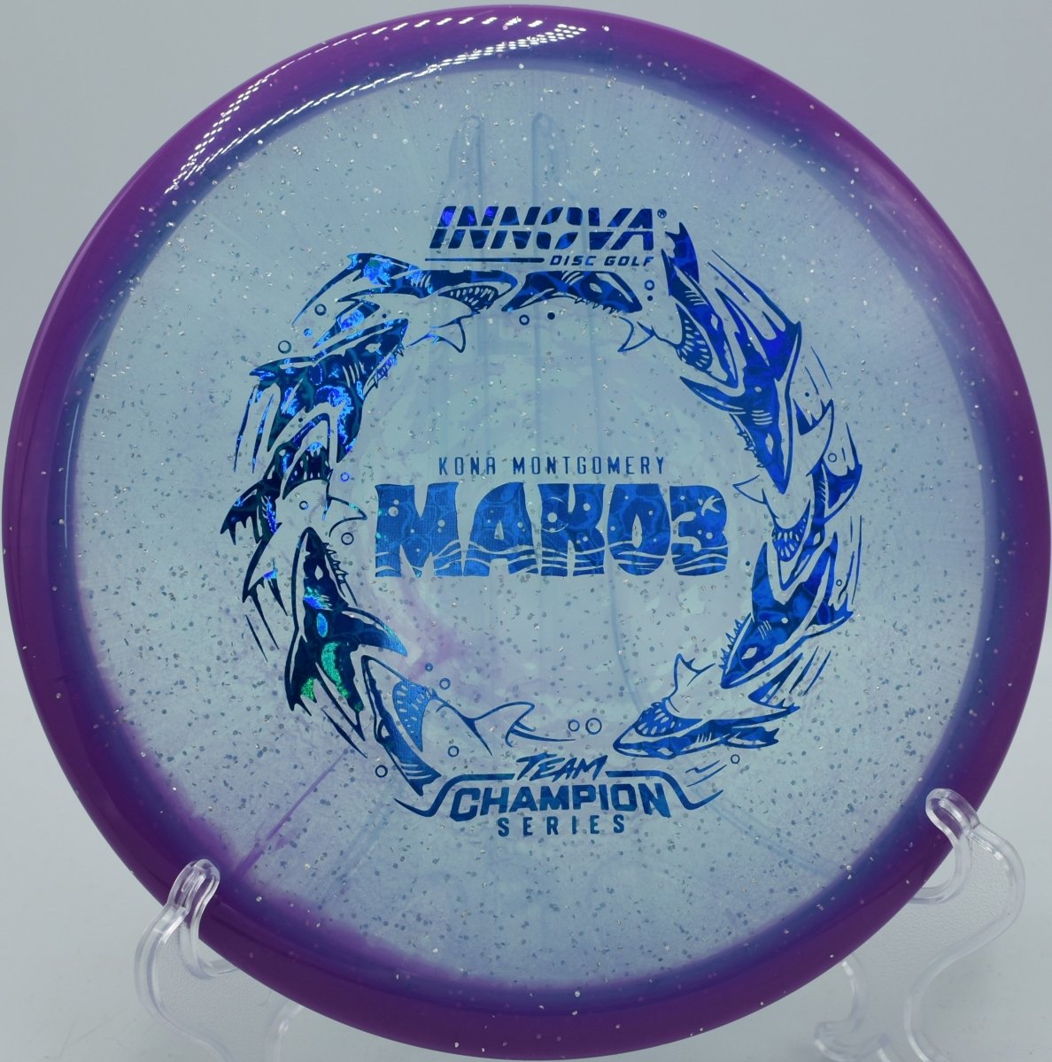 Metalflake Halo Champion Mako3 Kona Montgomery edition showcased at Harmony Bends Disc Golf Course in Columbia, Missouri, engineered for precise midrange control and effortless glide