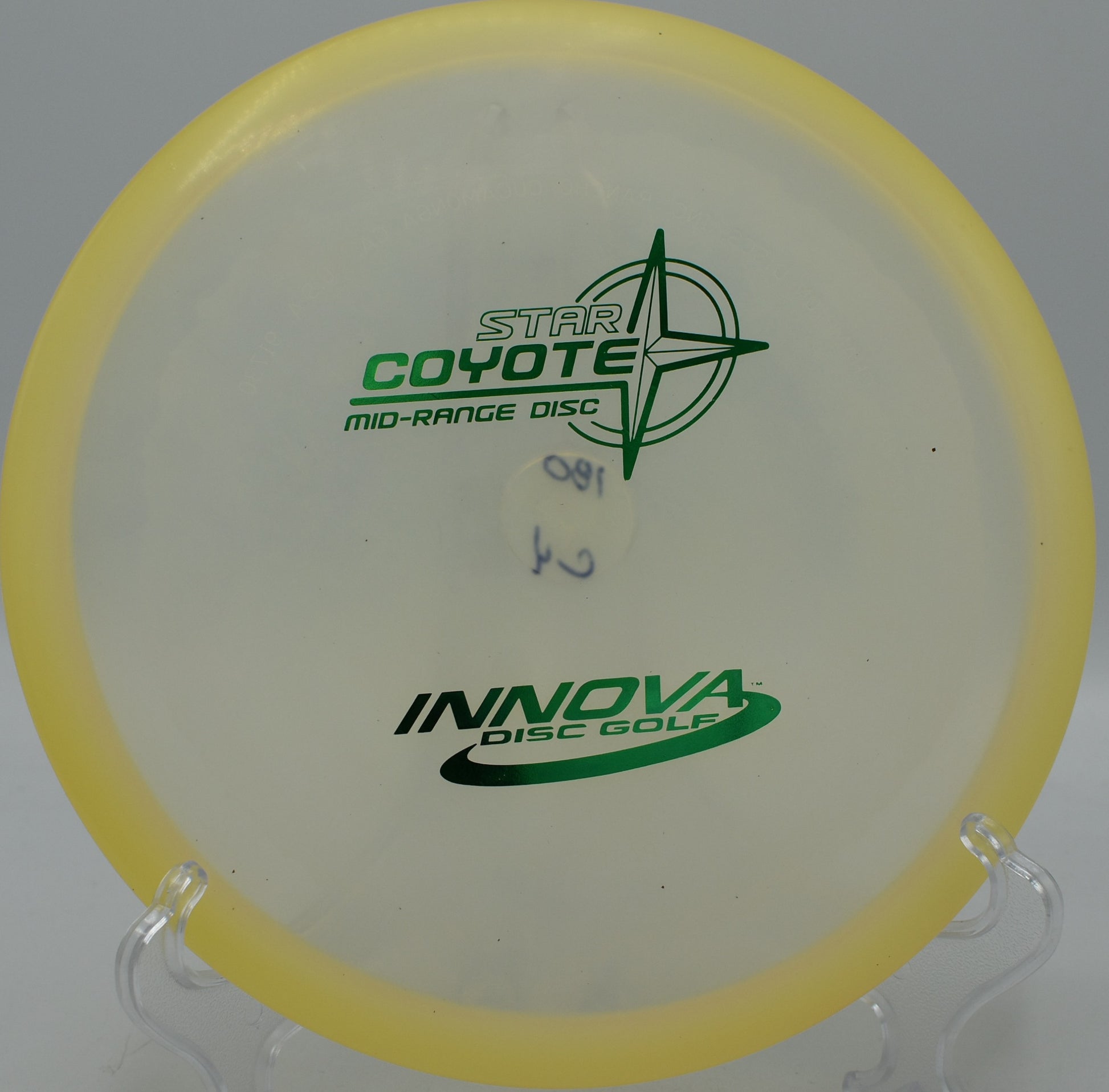 Champion Coyote gliding effortlessly through wooded gaps at Rocklin Disc Golf Course in Rocklin, California.

