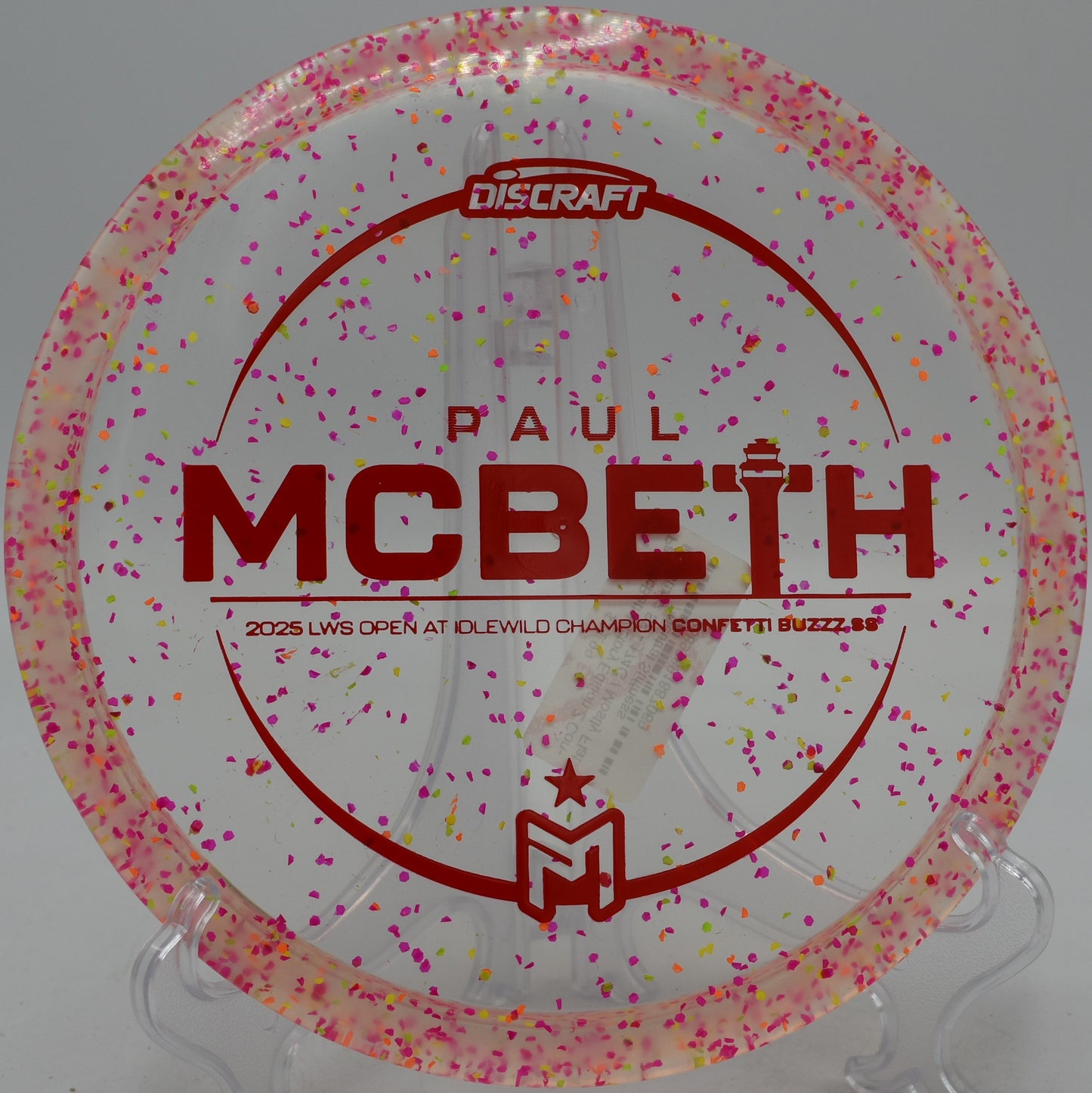 Discraft Confetti Buzzz SS laser-straight approach at Hornets Nest Disc Golf Course in Charlotte, North Carolina
