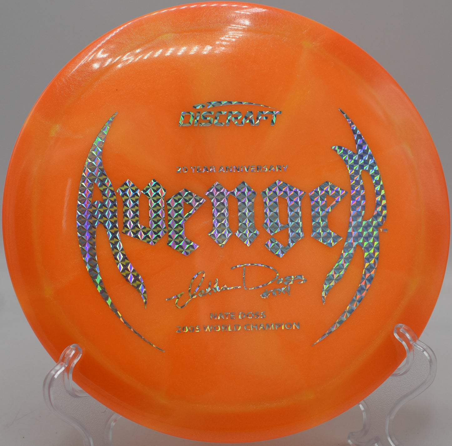 Discraft Z Colorshift Avenger flex shot around trees at Brickyard Crossing DGC in Indianapolis, Indiana