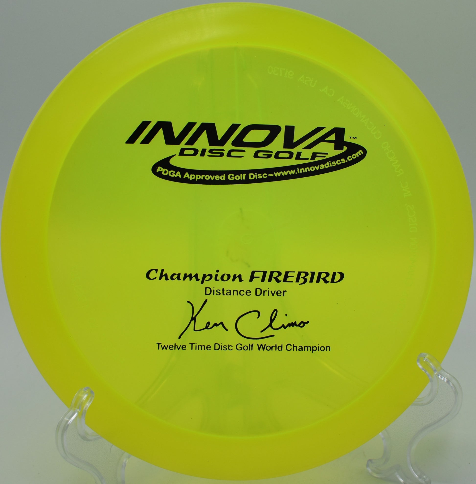 12x Pre-Flight Number Champion Firebird disc flying over open fairways at Harmony Bends Disc Golf Course, Columbia, Missouri, showcasing its overstable precision.