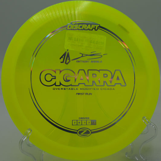 "At Maple Grove Disc Golf in Leicester, MA, Discraft Z Cigarra powers aggressive turnover shots with remarkable overstable control."
