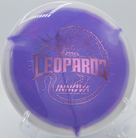 An Innova Halo Star Leopard3 landing softly on the green at Maple Hill Disc Golf Course in Leicester, Massachusetts, following a controlled turnover drive.