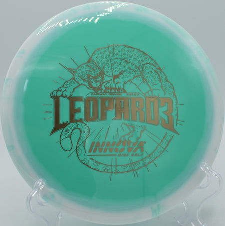 A player executing a standstill fairway drive with a Halo Star Leopard3 at Water Works Park Disc Golf Course in Kansas City, Missouri, navigating the technical terrain.