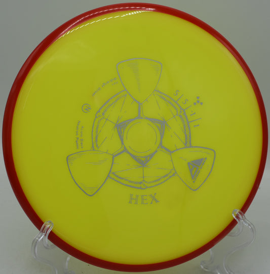 A player throwing the Neutron Hex on a windy tee pad at Sunset Park Disc Golf Course in Las Vegas, Nevada, showcasing its reliability and stability in tougher conditions.