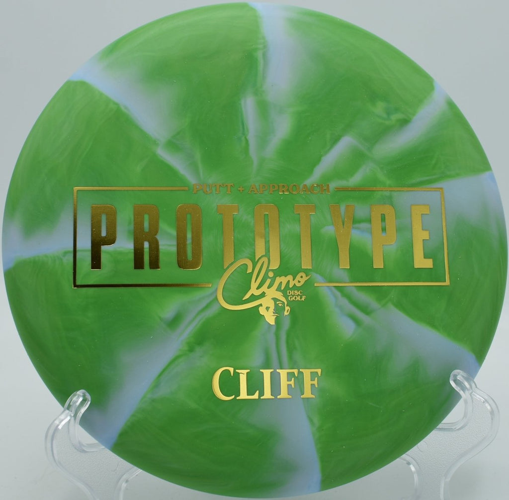 Prototype Cliff beadless putter gliding toward chains at Winthrop Arena Disc Golf Course in Rock Hill, South Carolina