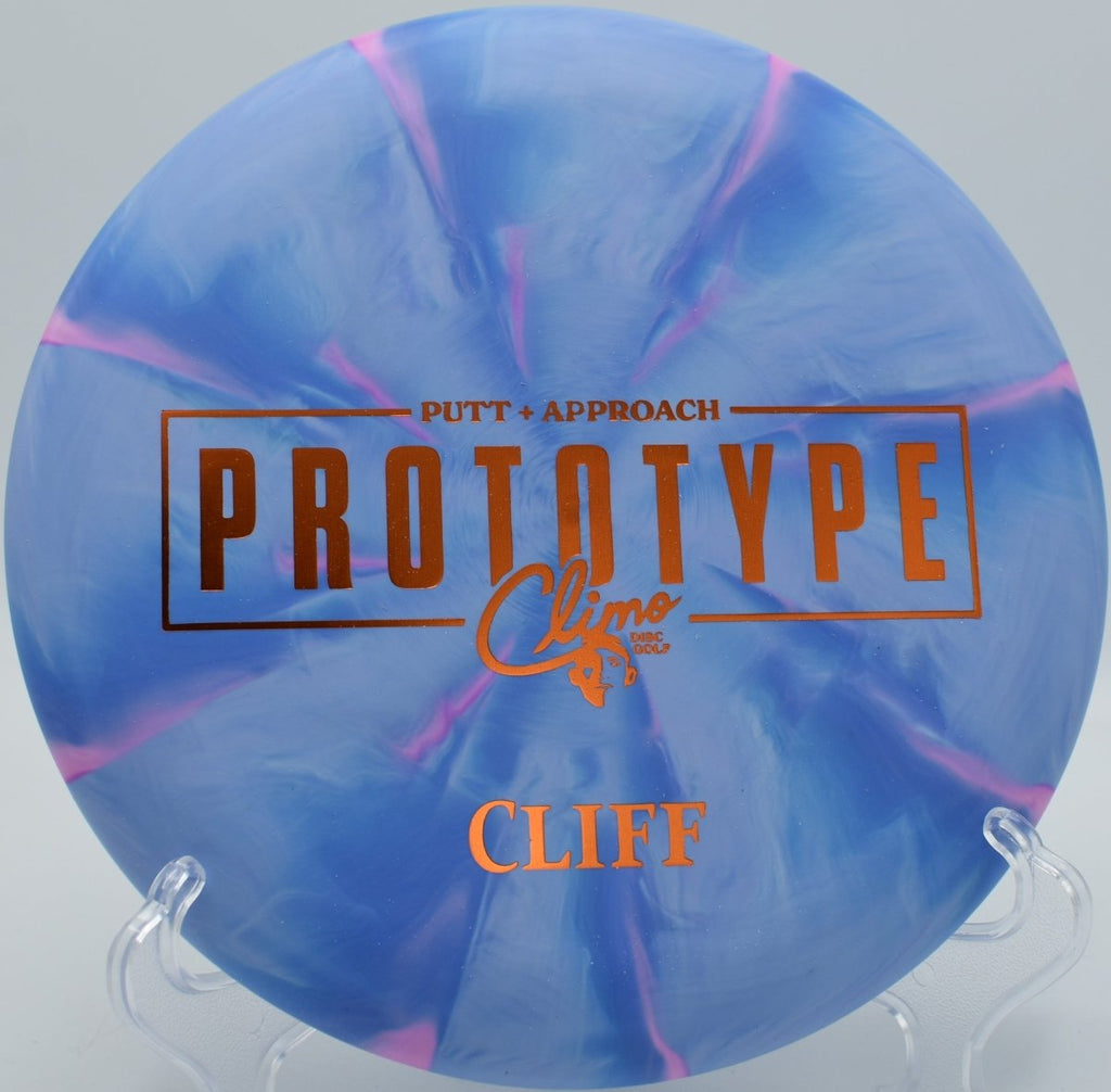 Trophy Line Cliff disc golf putter on hillside green at Toboggan Disc Golf Course in Milford, Michigan