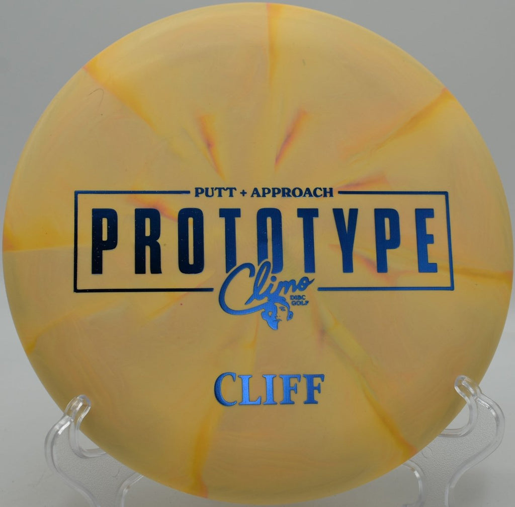 Prototype Trophy Line Cliff putter near chains at Golden Gate Park Disc Golf Course in San Francisco, California
