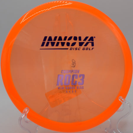 A perfectly placed Champion Roc3 landing softly on the green at Milo McIver Disc Golf Course in Estacada, Oregon, following a straight midrange shot.